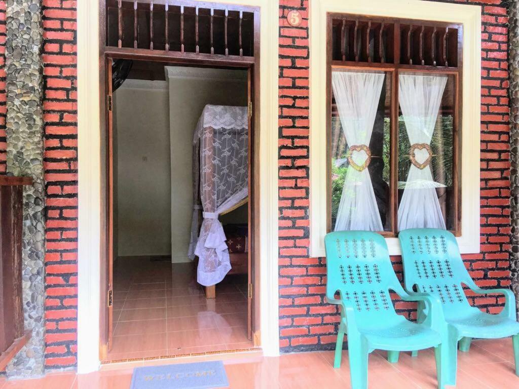 Sahnan Guest House Bukit Lawang Extérieur photo